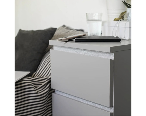 Sängbord med två lådor och dekorativ yta