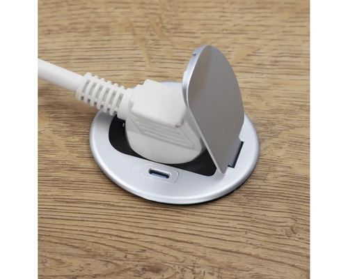 Infälld kontakt med öppet lock och ansluten kontakt.