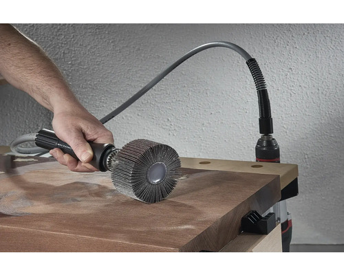 Flexibelt sliptillbehör som används på träyta