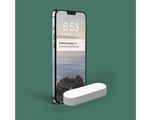 Smartphone med notis om elmätargränssnitt och elmätare