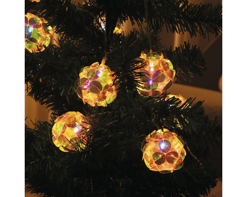 Ljuskedja med sfäriska lampor i julgranen