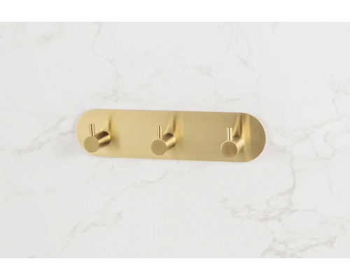 Väggmonterad hatthylla med tre krokar