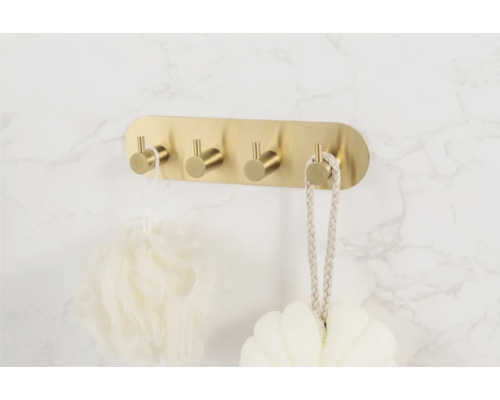 Väggmonterad hängare med fyra krokar i badrummet