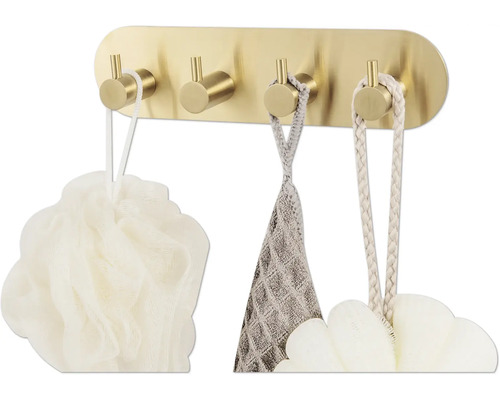 Väggmonterad hängare med fyra krokar och badrumsaccessoarer