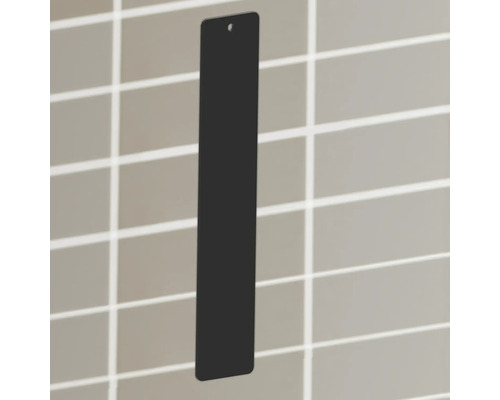 Svart inspektionslucka med inspektionshål