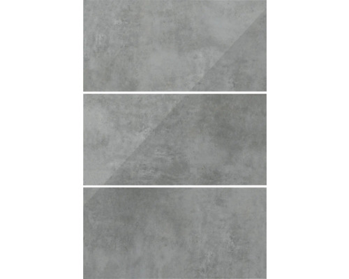 Tre grå plattor med betongutseende.