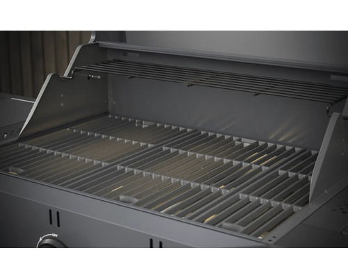 Öppen gasolgrill med grillgaller och varmhållningsgaller.