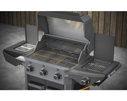 Gasolgrill med grillgaller, varmhållningsgaller och sidobord