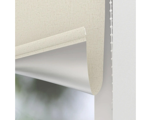 Detaljvy av en rullgardin med tygstruktur och manöverkedja