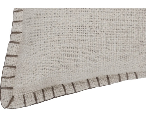 Detaljvy av en vävd matta med kantförstärkning