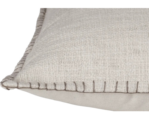 Prydnadskudde med strukturerad yta och dekorativ söm
