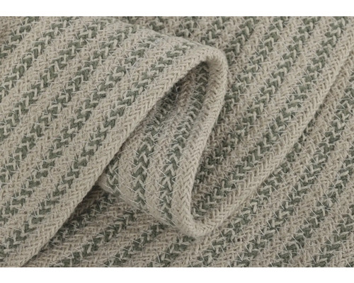 Närbild av en textil med vävt mönster