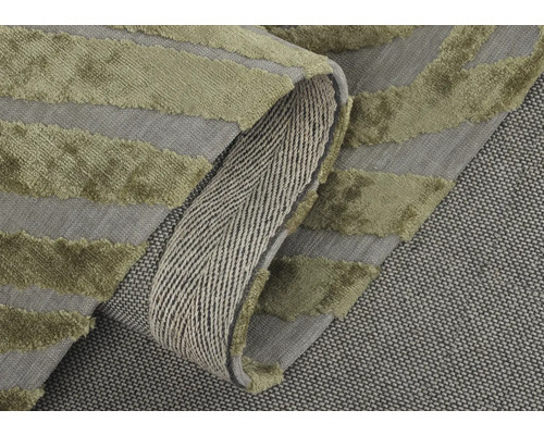 Detaljvy av en matta med randigt mönster