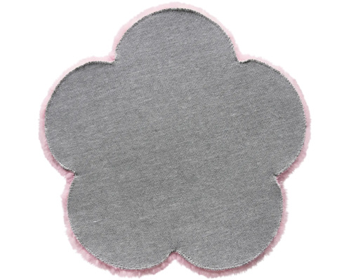 Blomformad matta med struktur och fluffig kant