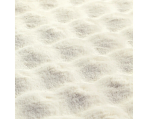 Närbild av en matta med vågig struktur