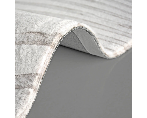 Detaljvy av en matta med randigt mönster