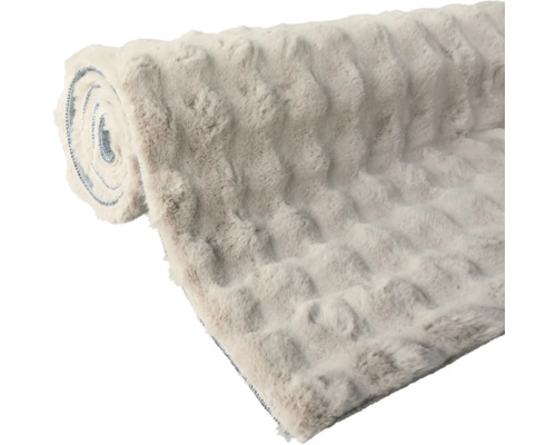 Rullad mjuk filt med präglat mönster