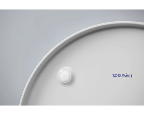 Detaljvy av ett runt keramiskt tvättställ med Duravit-logotyp och avloppsplugg