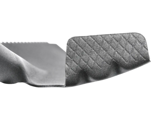 Detaljvy av ljudisolering med räfflad yta