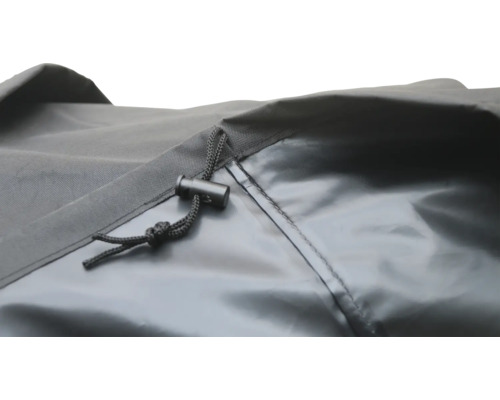 Detaljbild av ett skyddshölje med dragsko