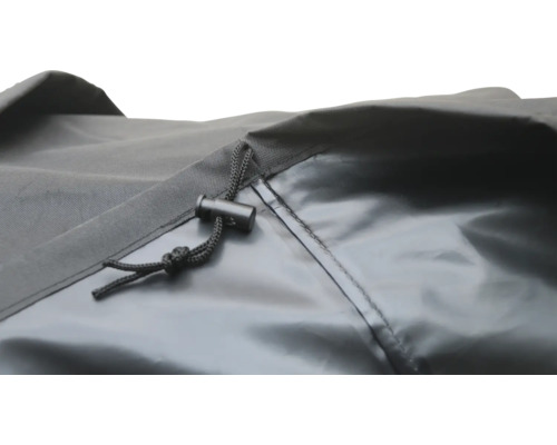 Närbild av ett skyddshölje med dragsko