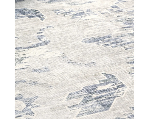 Detaljvy av en matta med geometriska mönster