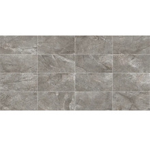 Grå plattor med stenutseende lagda i förband