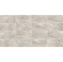 Rektangulära plattor med marmorstruktur, lagda i ett rutnät