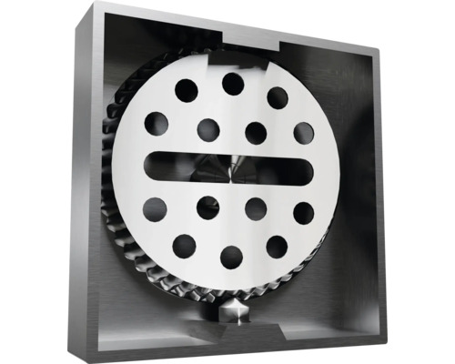 Skärmaskin med runt blad med hål och en slits i ett metallhölje.