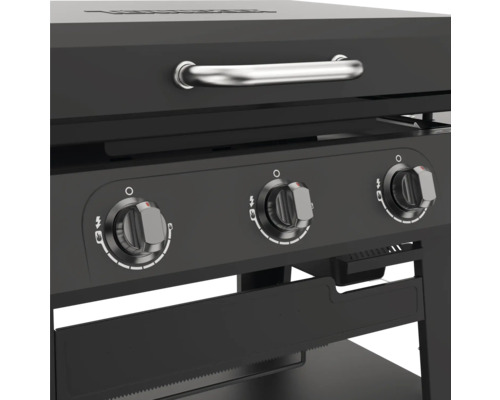 Detaljvy av svart gasolgrill med vridknappar för styrning