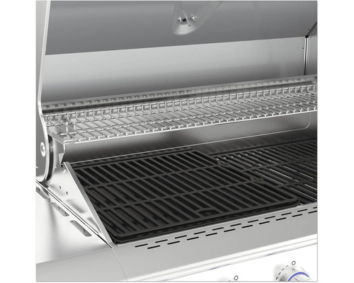 Inre vy av en grill med grillgaller