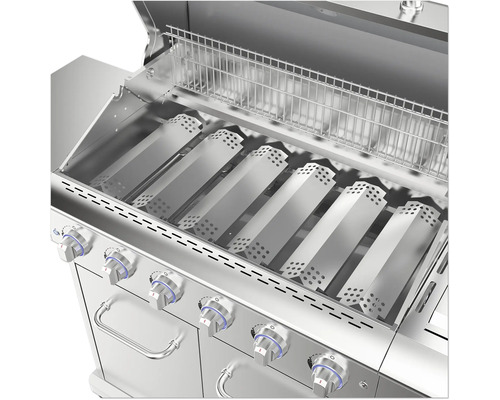 Interiörvy av en gasgrill i rostfritt stål med grillgaller och brännarkåpor