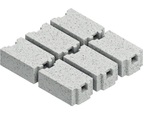 Flera betongblock med not och spont