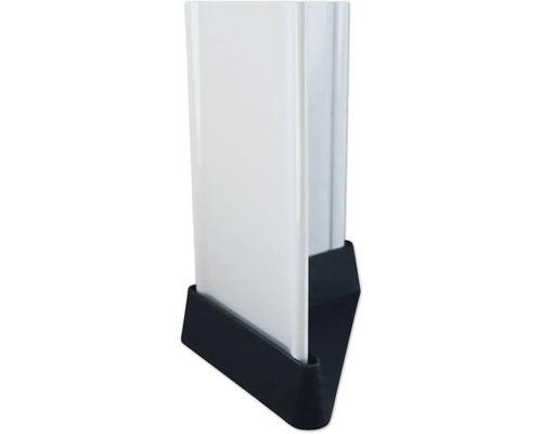 Detaljvy av en vit stolpe med svart fot