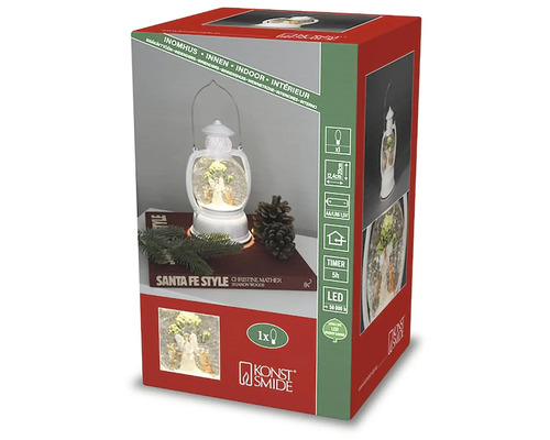 Förpackning med en snöglobslykta för inomhusbruk från Konstsmide med LED-belysning och timerfunktion