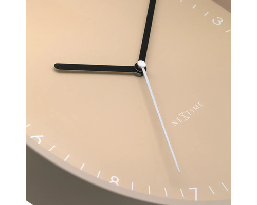 Nextime Logotyp på en väggklocka