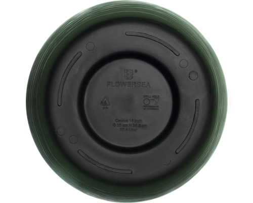 Undersida av en blomkruka med tillverkarinformation