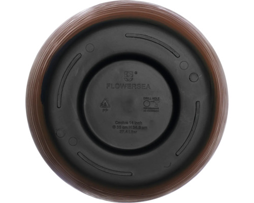 Undersida av en blomkruka med markeringar om material och storlek