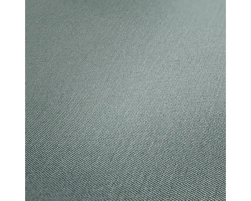 Närbild av en textiltapet med fin struktur