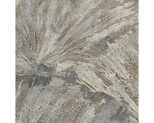 Närbild av en dekorativ putsyta med ett strålningsmönster