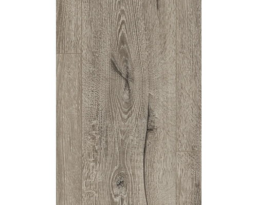 Detaljbild av laminatgolv med träutseende och kvistar.