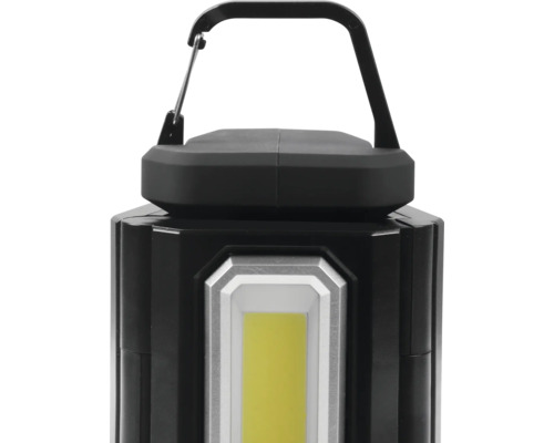 Svart arbetslampa med handtag