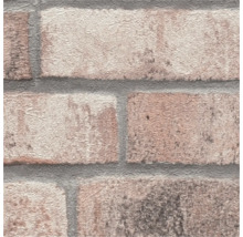 Närbild av tapet med tegelstensdesign