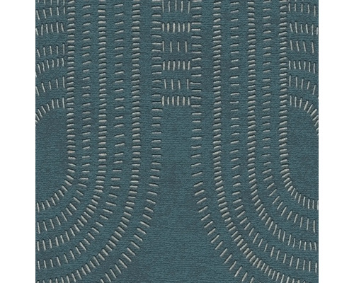 Närbild av en mönstrad matta med raka och cirkulära linjer.