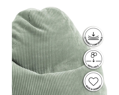 Detaljvy av sittsäck med manchesteröverdrag och hänvisningar till komfort, påfyllningsbarhet och tillverkning i Tyskland