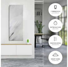 Infraröd värmare med marmorutseende och termostat på en byrå