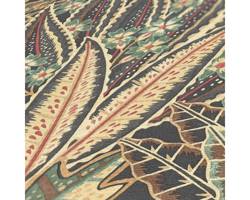 Närbild av en textildesign med blad- och blomstermönster