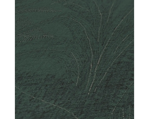 Detalj av en mörkgrön tapet med mönster