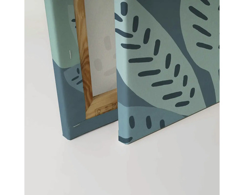 Närbild av canvastavla med botaniskt motiv och träram