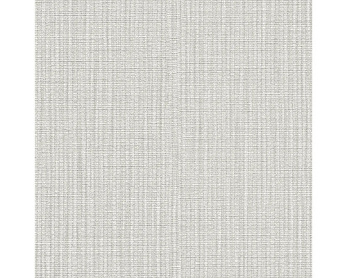 Detaljbild av en ljus non-woven tapet med textilmönster